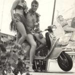 1964 man and woman on Lambretta scooter with Hawaii clothes