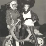 1968 man and woman next to Lambretta scooter