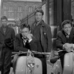 Jean Paul Belmondo (on the right) with another man on Lambretta scooters