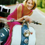 Cameron Diaz on white and blue Lambretta scooter